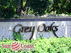 GREY OAKS sign