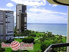 Le Rivage Condominium Building and Community Pool overlooking the Water